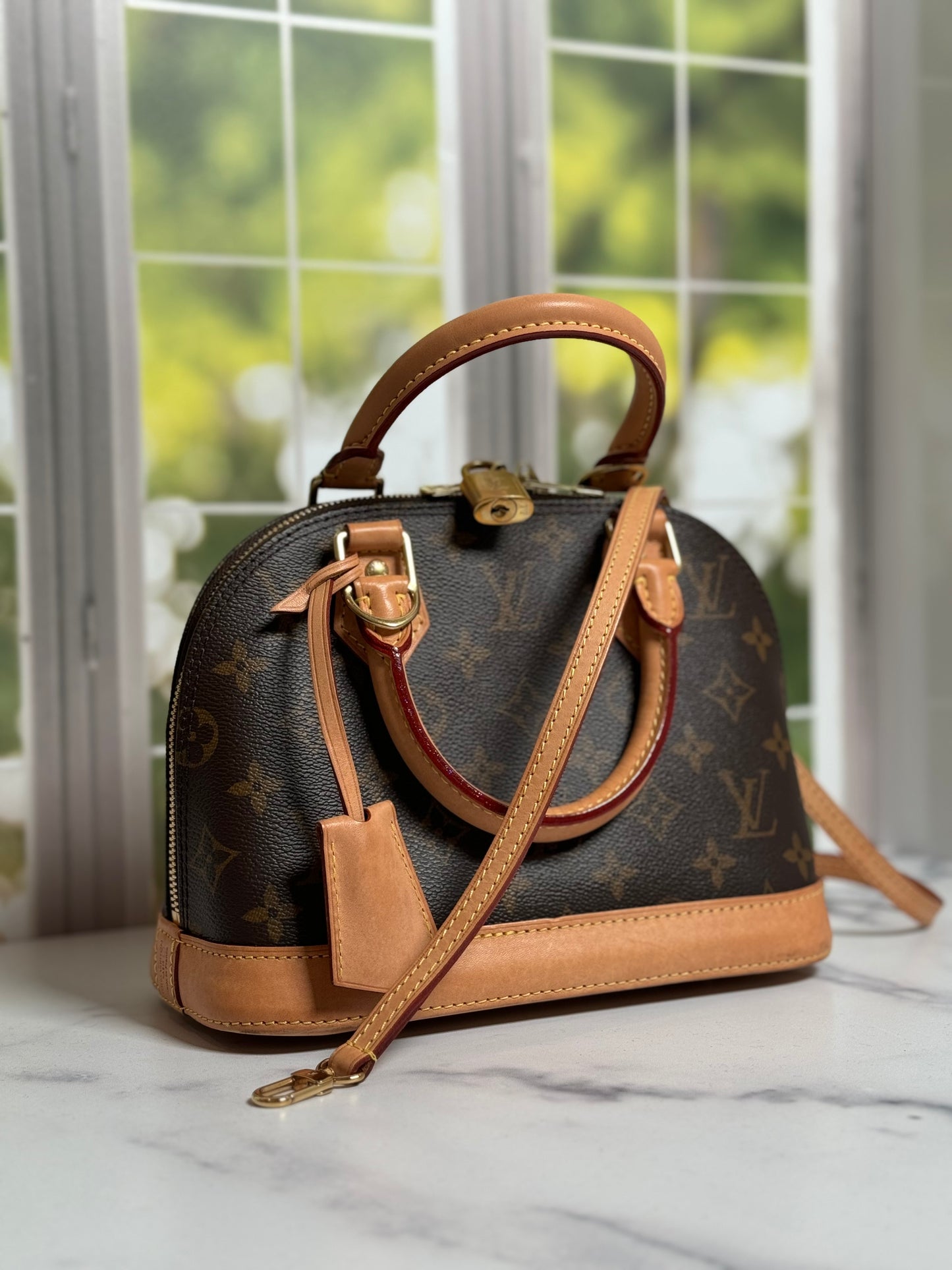 Preowned Louis Vuitton Alma Bb monogram