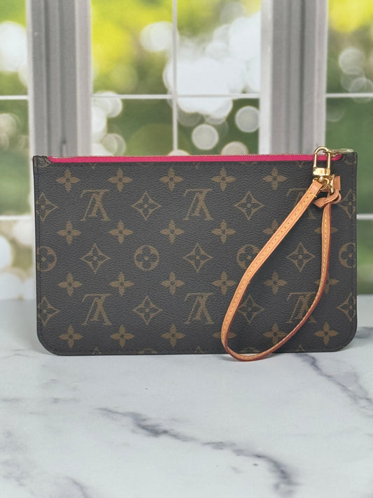 Preowned Wristlet/clutch Monogram